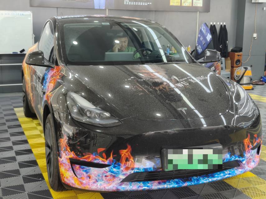 Tesla Model Y 2024 #5 Tesla Model Y 2024 car image #5