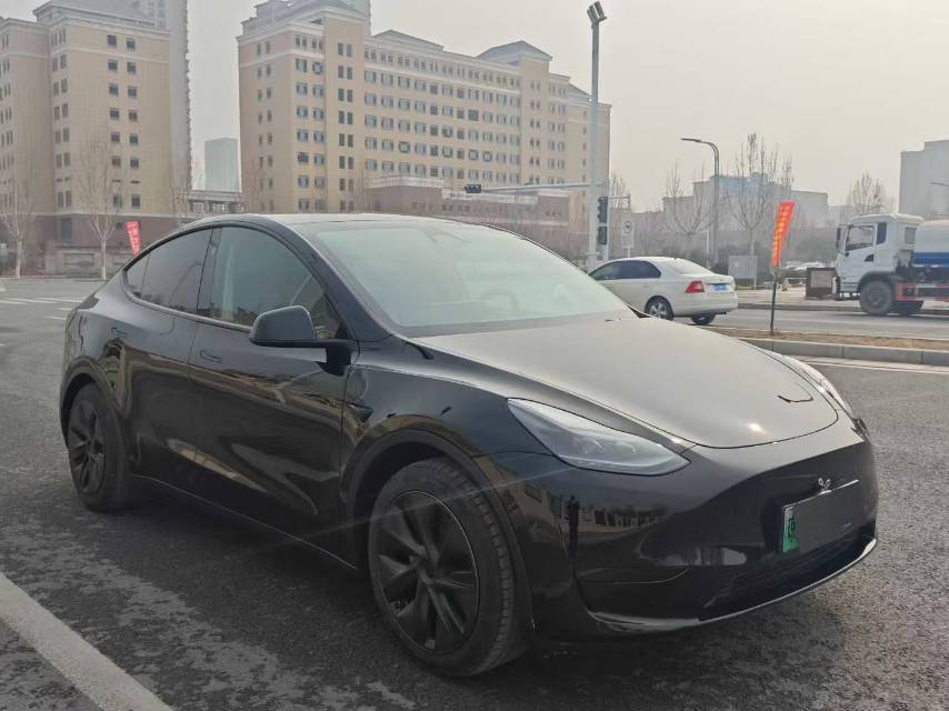 Tesla Model Y 2024 #5 Tesla Model Y 2024 car image #5