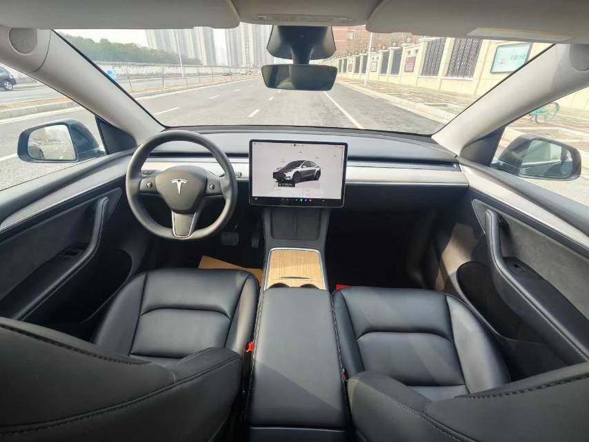 Tesla Model Y 2024 #7 Tesla Model Y 2024 car image #7