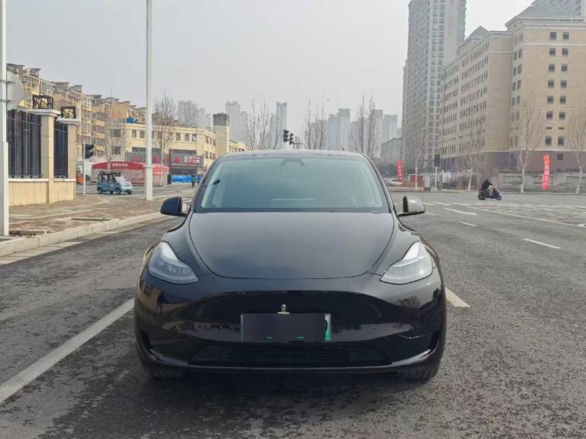 Tesla Model Y 2024 #4 Tesla Model Y 2024 car image #4
