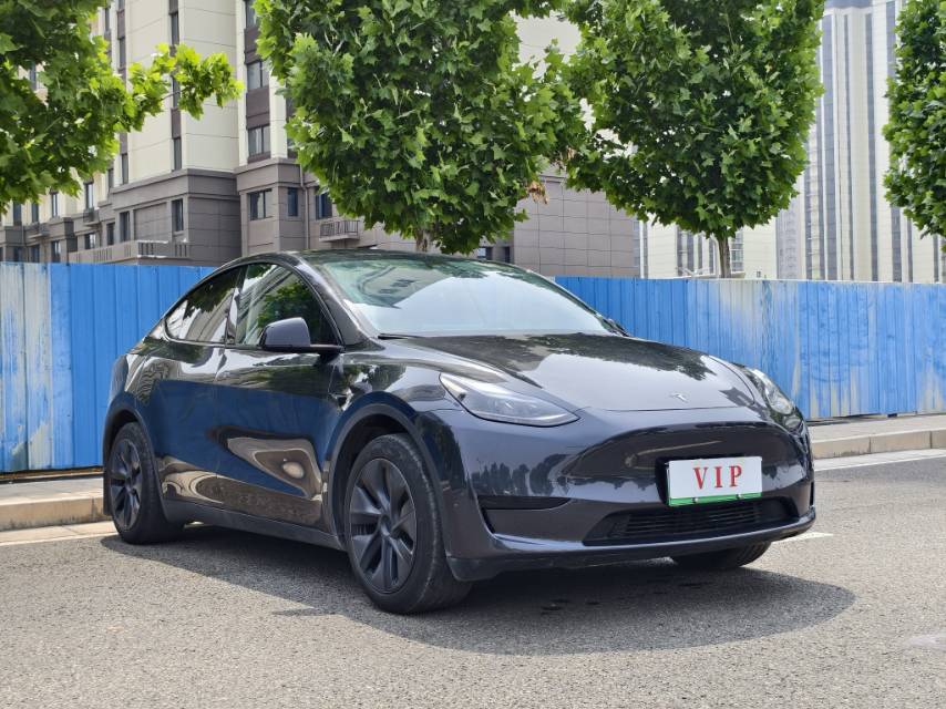 Tesla Model Y 2024 #5 Tesla Model Y 2024 car image #5