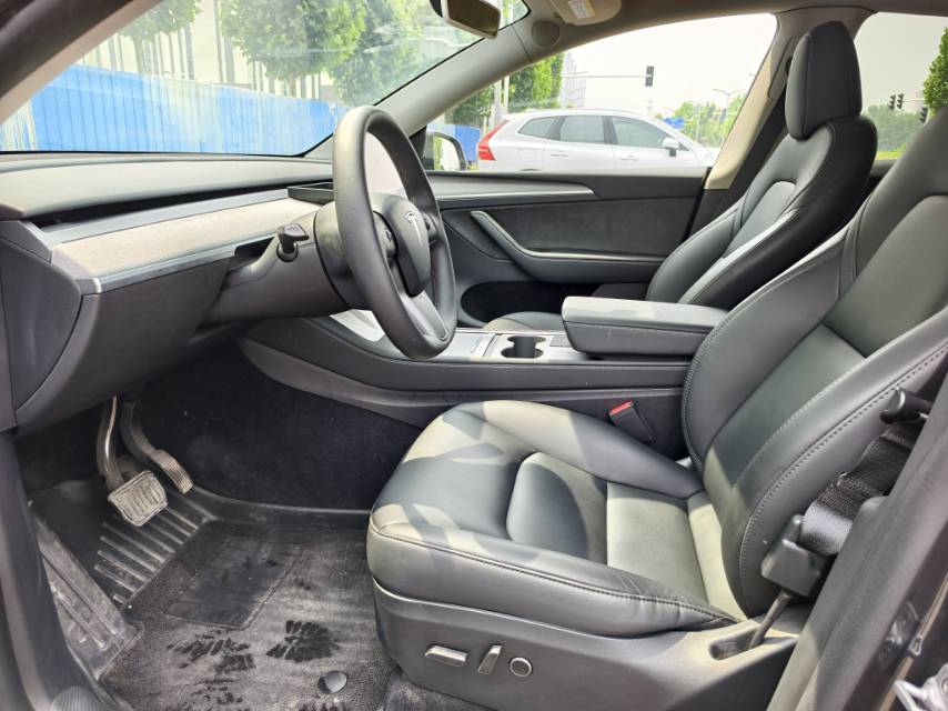 Tesla Model Y 2024 #7 Tesla Model Y 2024 car image #7