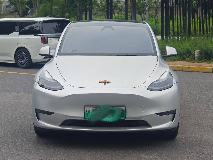 Tesla Model Y 2024 #4 Tesla Model Y 2024 car image #4