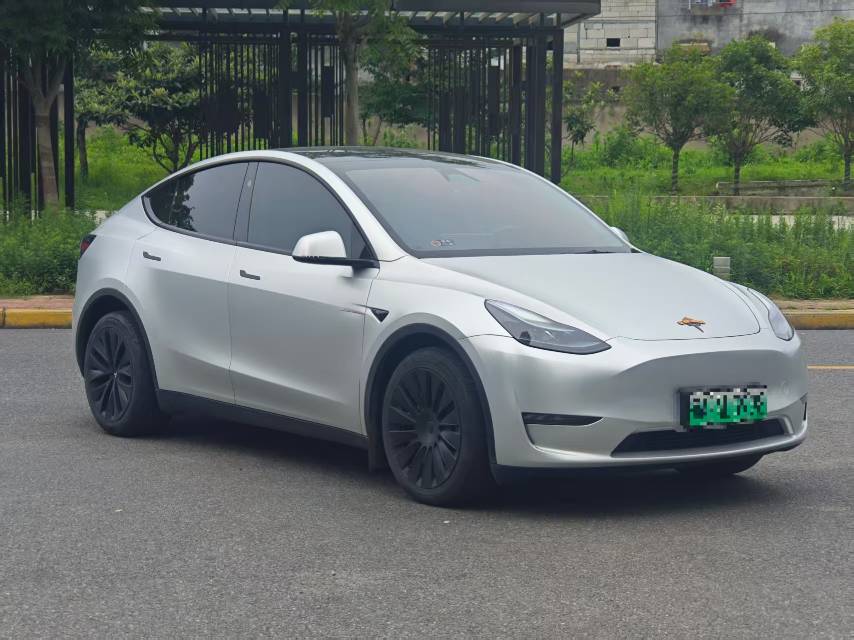Tesla Model Y 2024 #8 Tesla Model Y 2024 car image #8