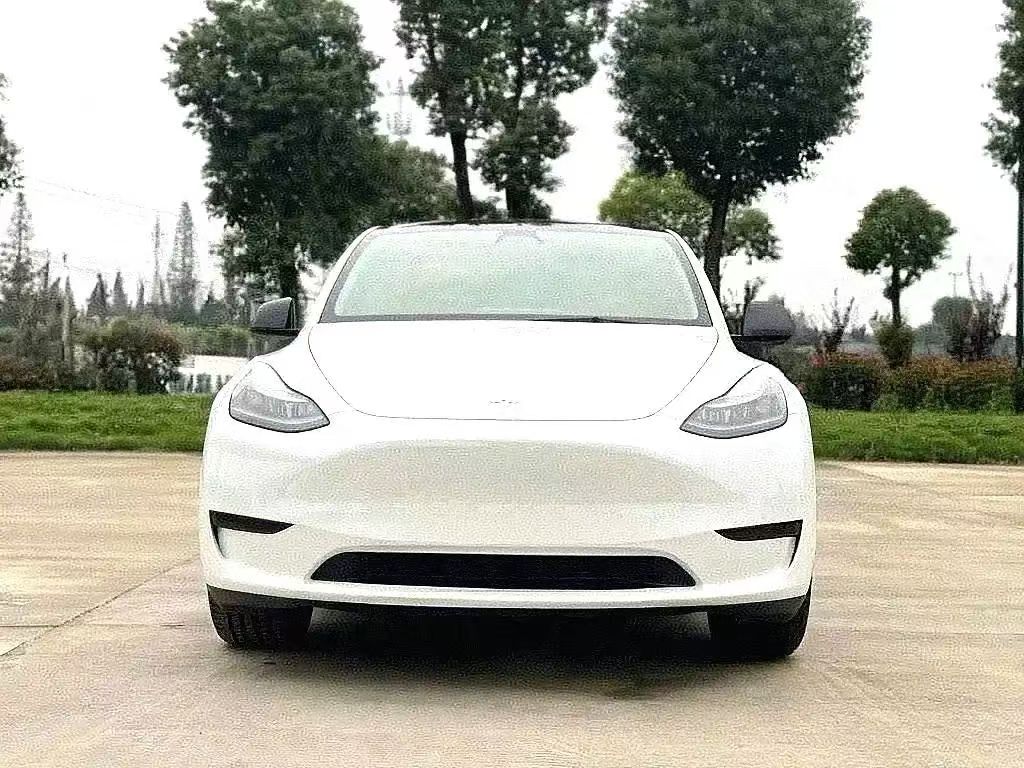 Tesla Model Y 2024 #4 Tesla Model Y 2024 car image #4