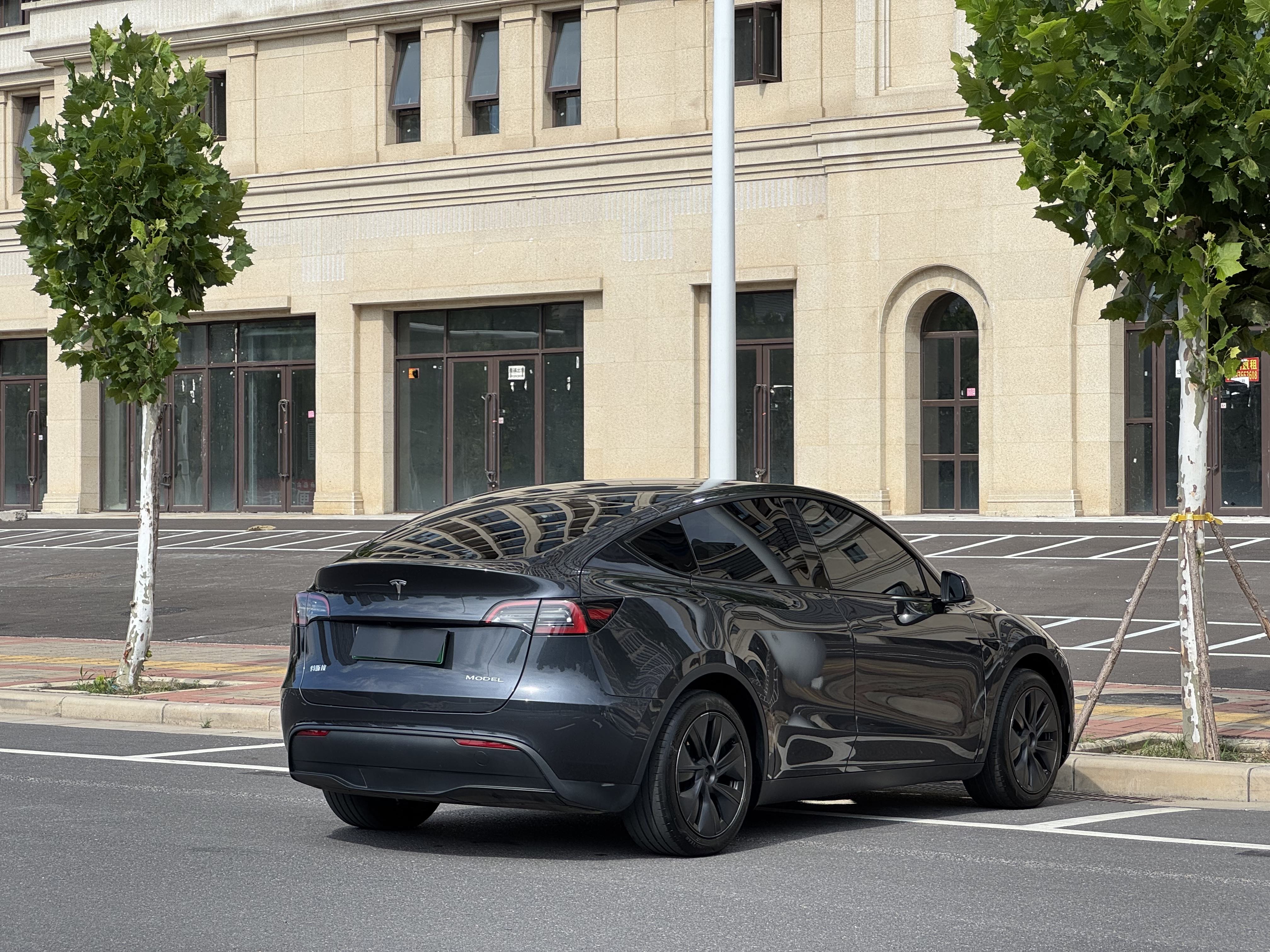 Tesla Model Y 2024 #15 Tesla Model Y 2024 car image #15