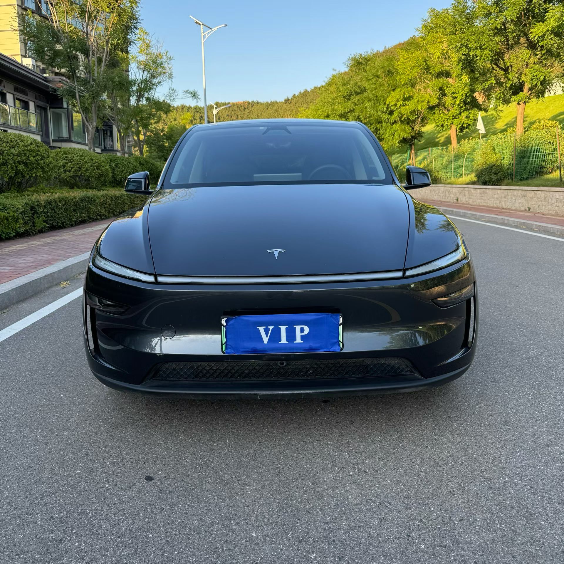 Tesla Model Y 2025 #4 Tesla Model Y 2025 car image #4