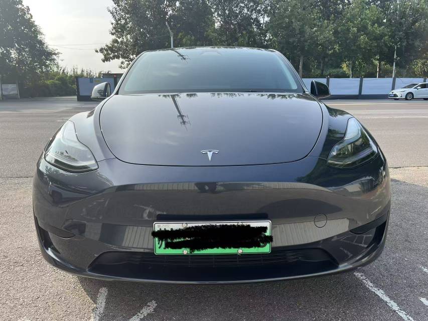 Tesla Model Y 2024 #5 Tesla Model Y 2024 car image #5