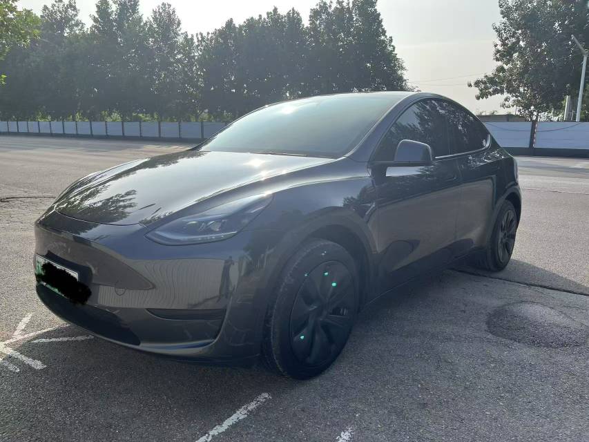 Tesla Model Y 2024 #2 Tesla Model Y 2024 car image #2