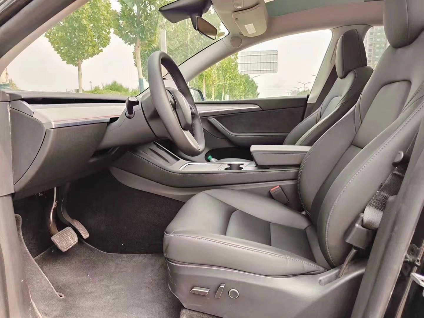 Tesla Model Y 2024 #7 Tesla Model Y 2024 car image #7