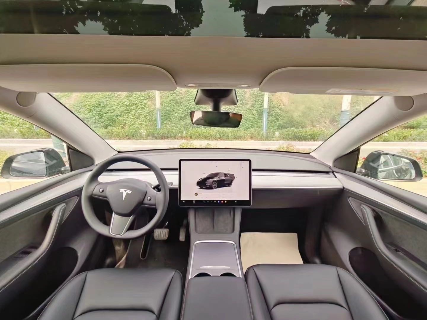 Tesla Model Y 2024 #6 Tesla Model Y 2024 car image #6