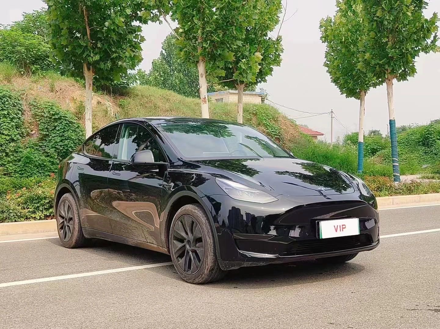 Tesla Model Y 2024 #5 Tesla Model Y 2024 car image #5