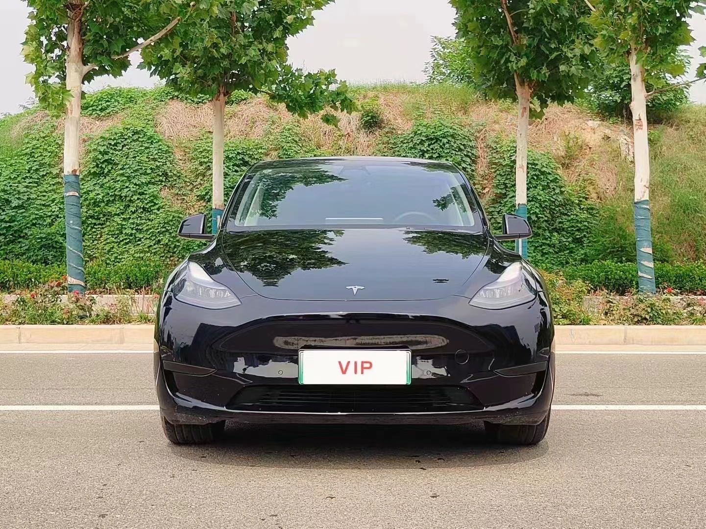 Tesla Model Y 2024 #4 Tesla Model Y 2024 car image #4
