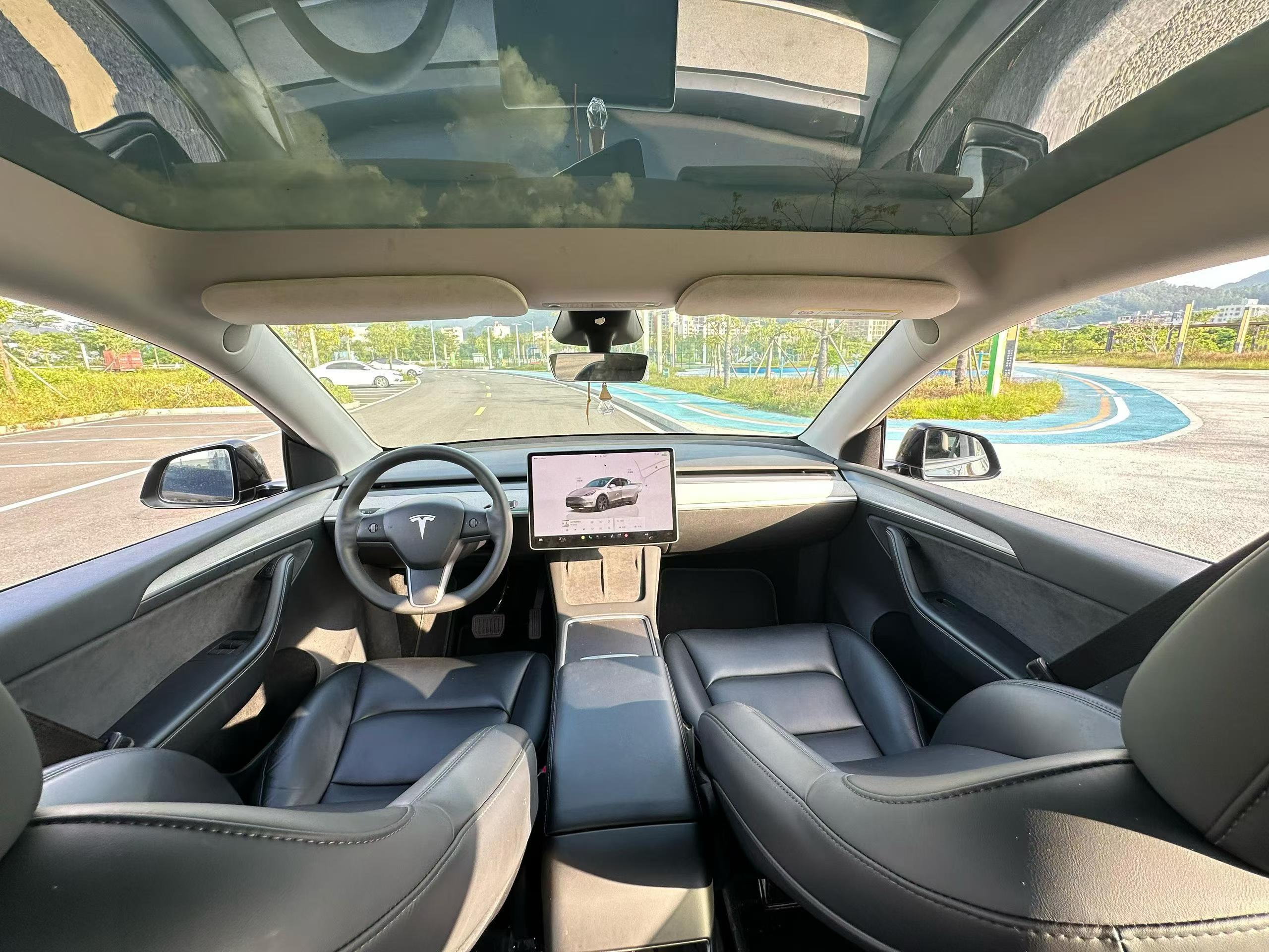 Tesla Model Y 2024 #7 Tesla Model Y 2024 car image #7