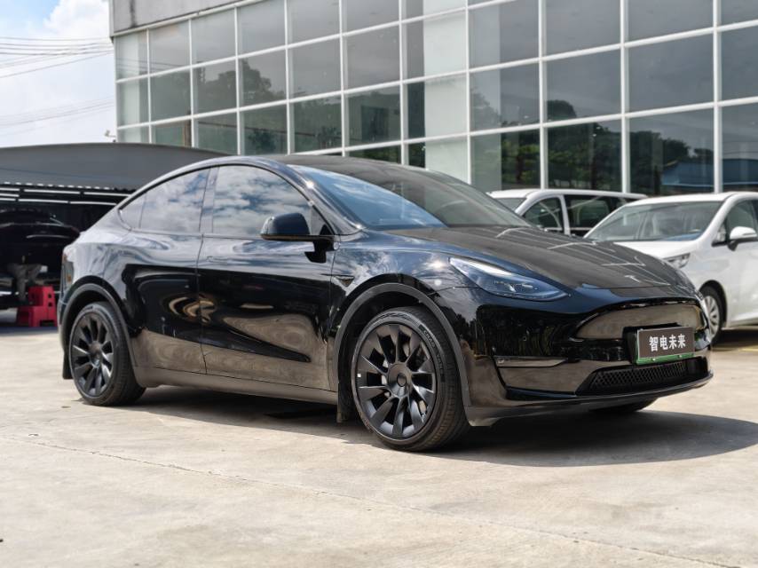Tesla Model Y 2024 #2 Tesla Model Y 2024 car image #2