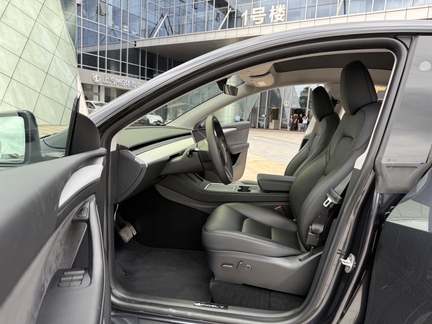 Tesla Model Y 2024 #7 Tesla Model Y 2024 car image #7
