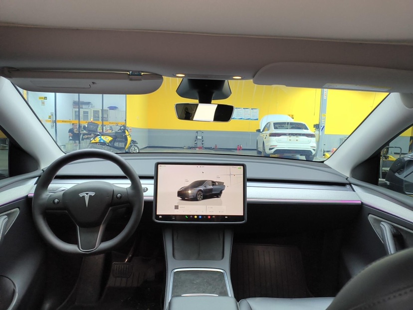 Tesla Model Y 2024 #6 Tesla Model Y 2024 car image #6