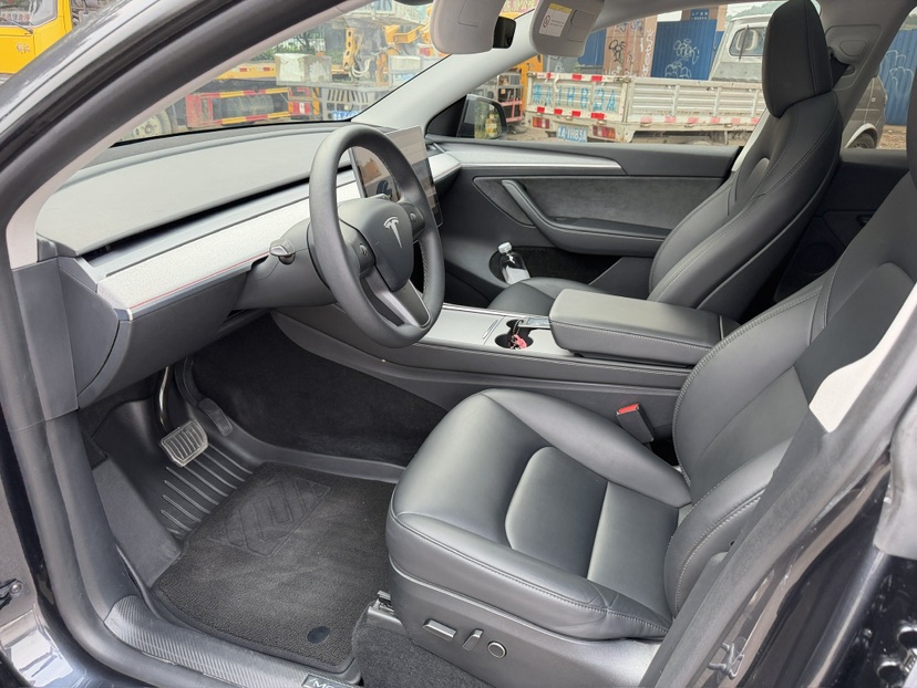 Tesla Model Y 2024 #5 Tesla Model Y 2024 car image #5