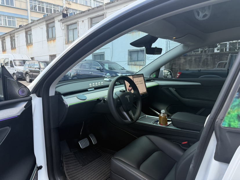 Tesla Model Y 2024 #4 Tesla Model Y 2024 car image #4