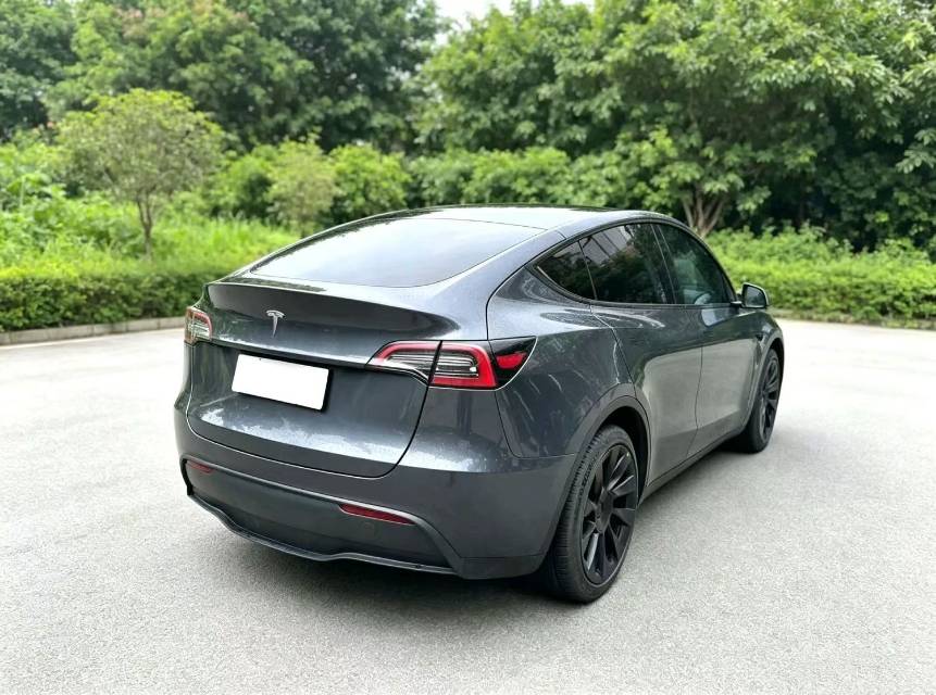 Tesla Model Y 2024 #7 Tesla Model Y 2024 car image #7