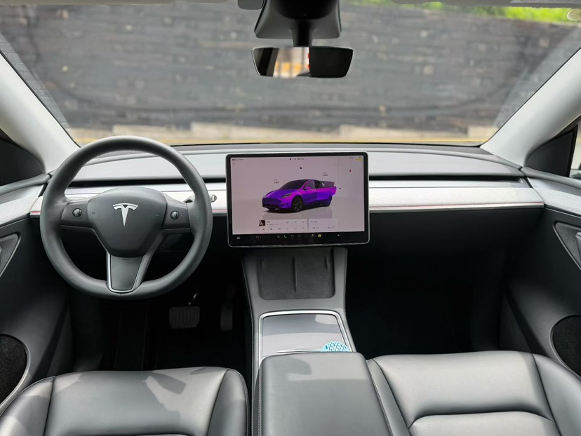 Tesla Model Y 2024 #6 Tesla Model Y 2024 car image #6