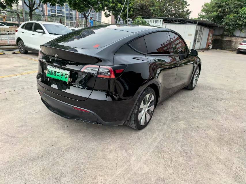 Tesla Model Y 2023 #6 Tesla Model Y 2023 car image #6
