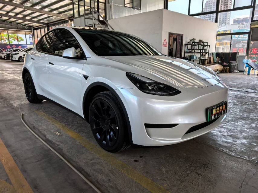 Tesla Model Y 2024 #3 Tesla Model Y 2024 car image #3