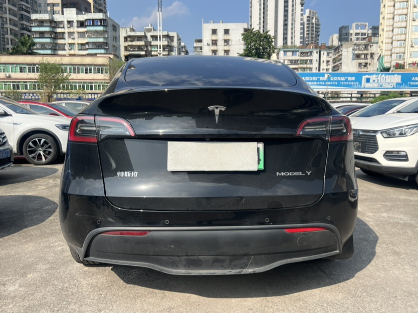 Tesla Model Y 2023 #5 Tesla Model Y 2023 car image #5