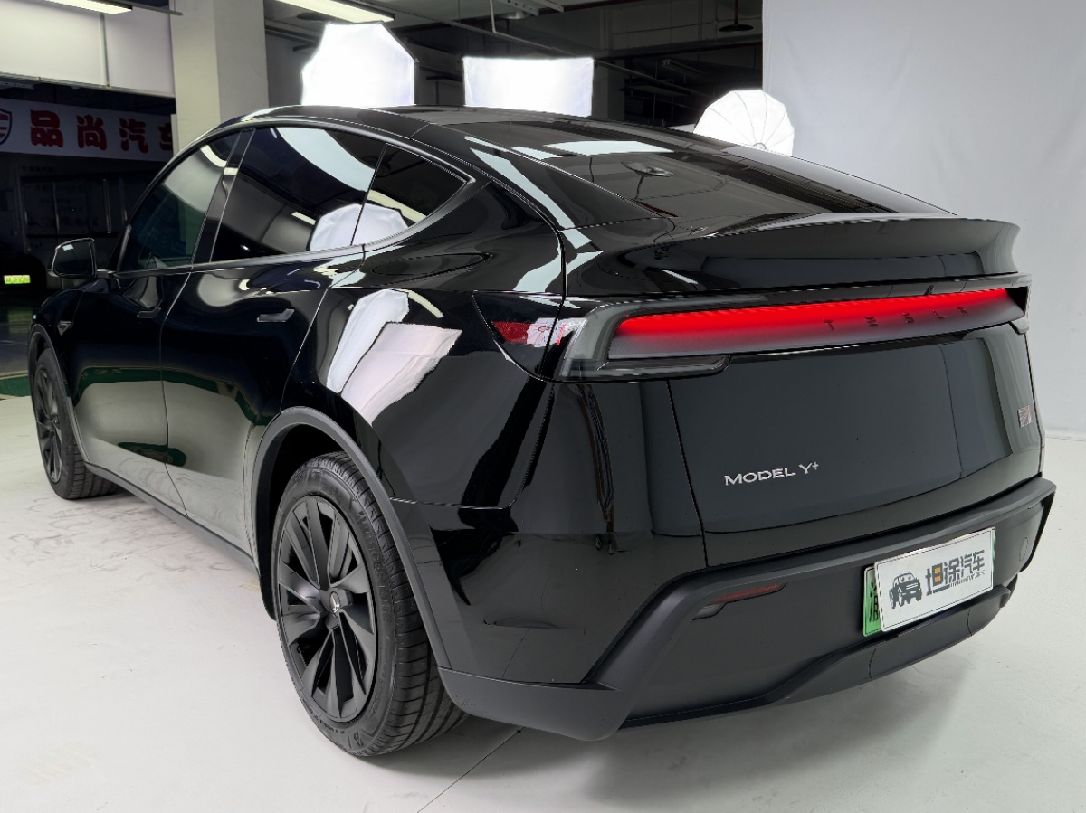 Tesla Model Y 2025 #11 Tesla Model Y 2025 car image #11