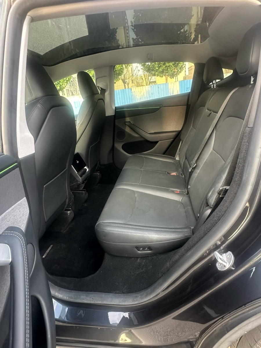 Tesla Model Y 2025 #5 Tesla Model Y 2025 car image #5