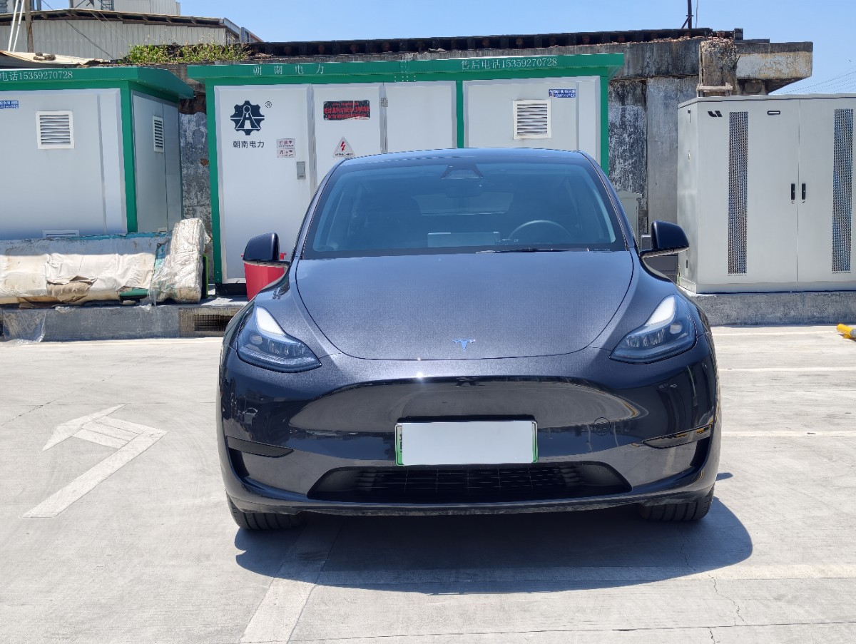 Tesla Model Y 2024 #2 Tesla Model Y 2024 car image #2
