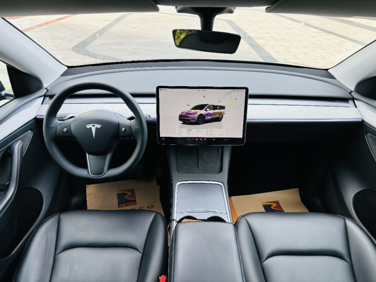 Tesla Model Y 2024 #6 Tesla Model Y 2024 car image #6