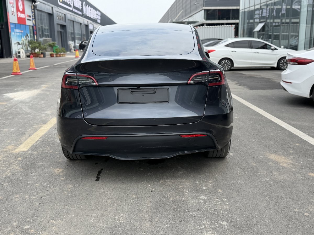 Tesla Model Y 2024 #4 Tesla Model Y 2024 car image #4
